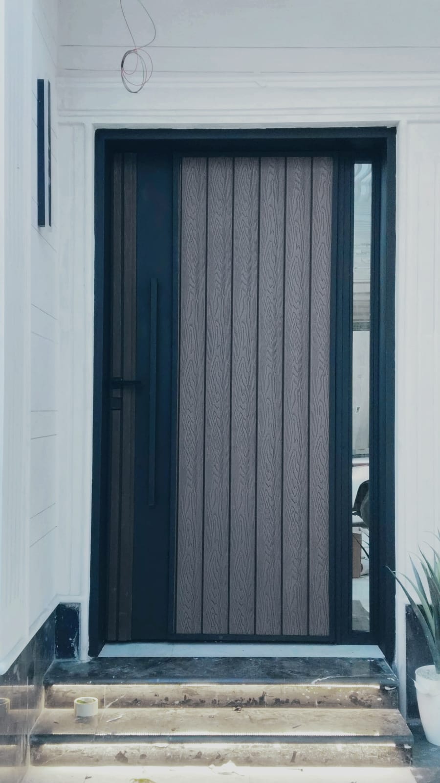 تلبيس ابواب حديد بألواح بديل الخشب