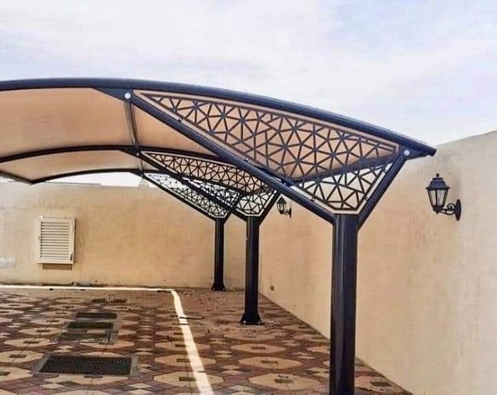 مظلات مواقف سيارات بقصات ليزر بالرياض